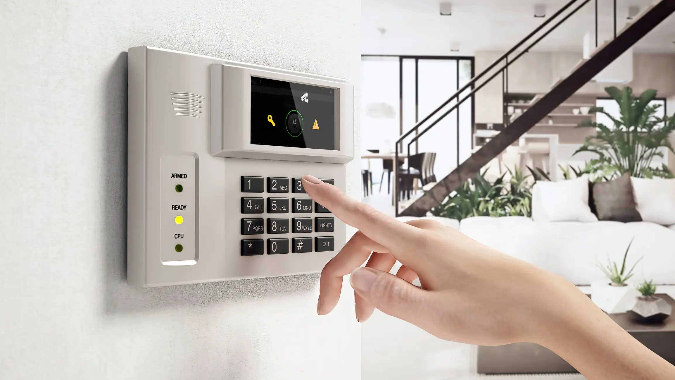Person entering code on a home security keypad.